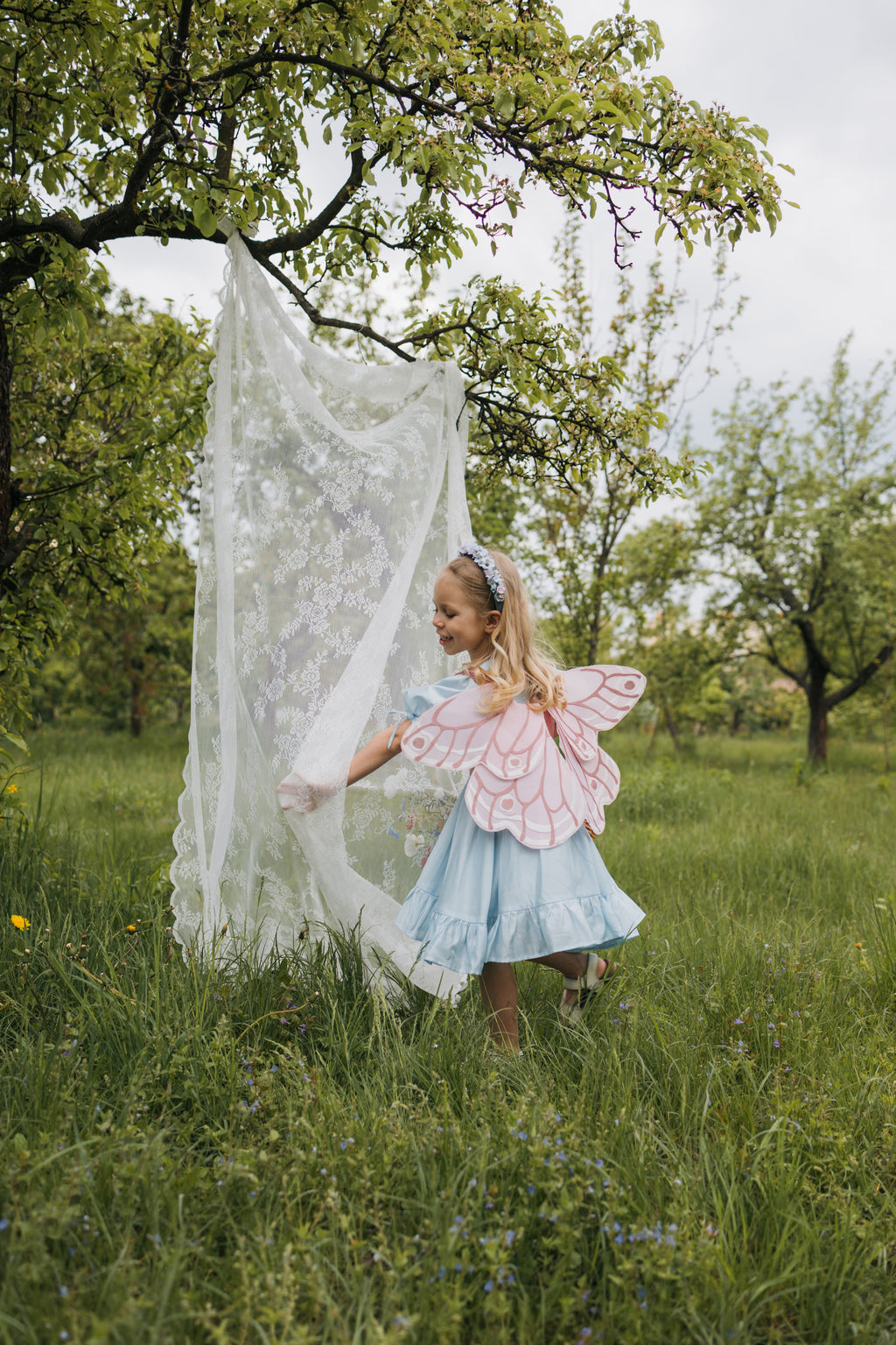 Крила на корсеті рожеві