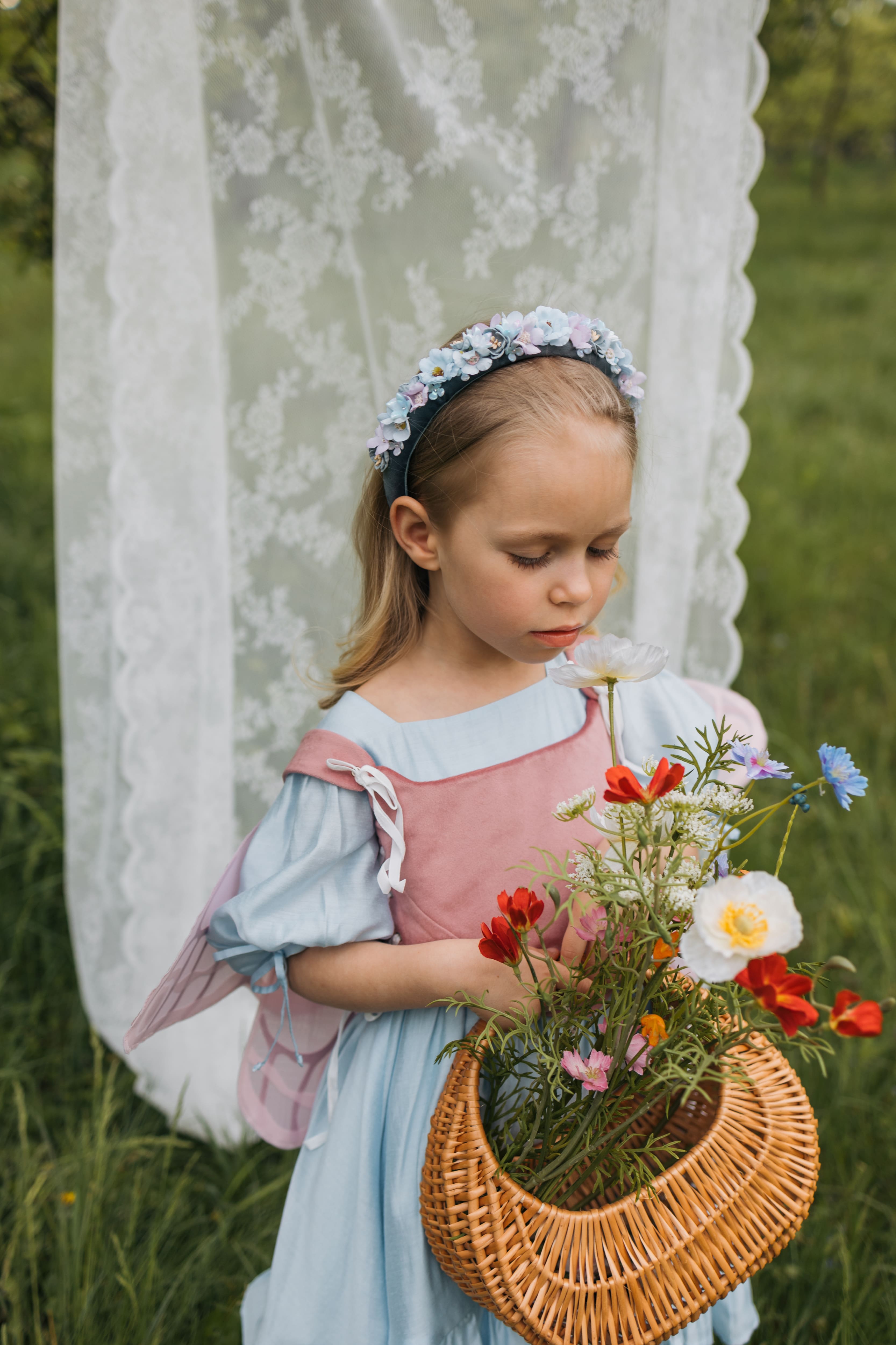 Крила на корсеті рожеві